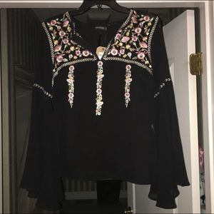 From earthbound. Tag still attached/never worn